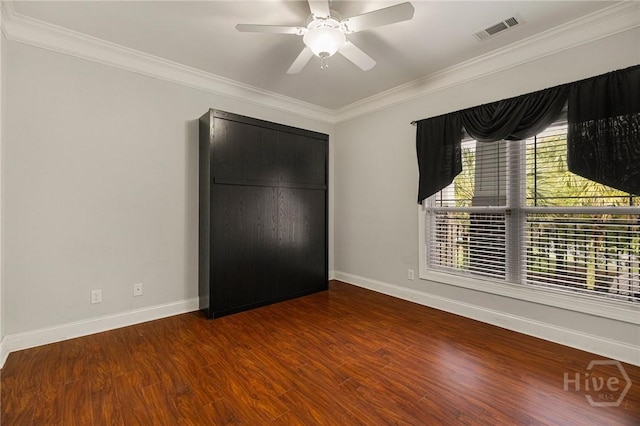 2805 River Oaks Dr Unit 2805, Richmond Hill, GA 31324 - unfurnished bedroom with crown molding, wood finished floors, a closet, and ceiling fan