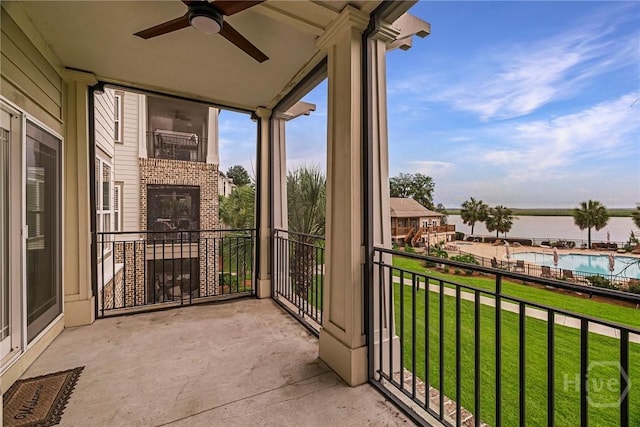 2805 River Oaks Dr Unit 2805, Richmond Hill, GA 31324 - balcony with a ceiling fan and a water view