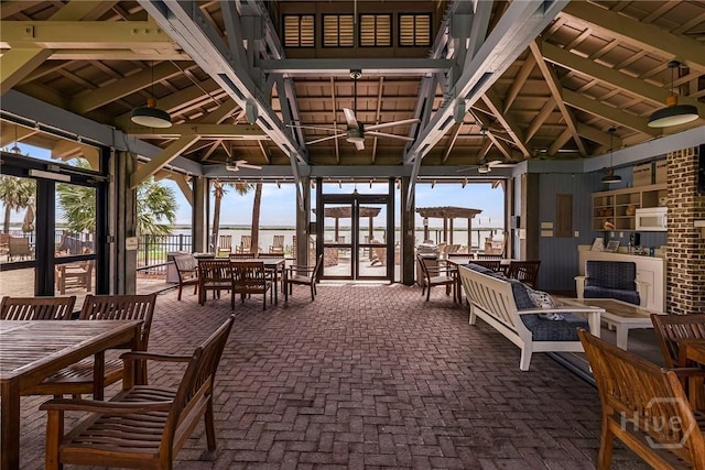 2805 River Oaks Dr Unit 2805, Richmond Hill, GA 31324 - view of patio featuring a gazebo, ceiling fan, outdoor dining area, and a water view