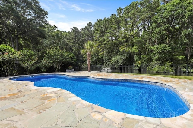706 Southbridge Blvd, Savannah, GA 31405 - view of swimming pool with a patio and view of wooded area