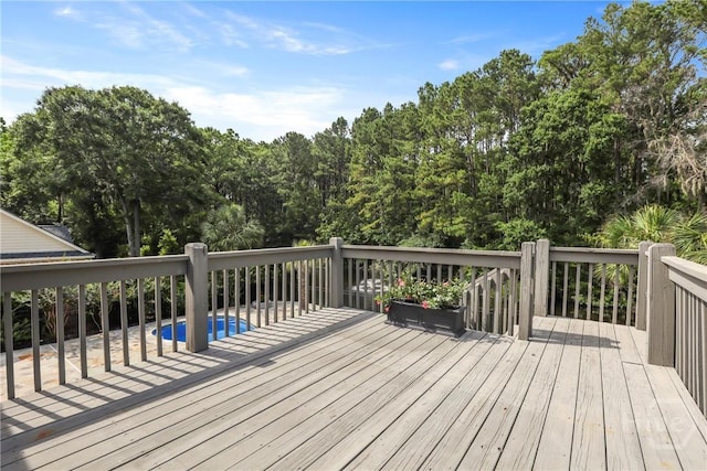 706 Southbridge Blvd, Savannah, GA 31405 - wooden terrace featuring an outdoor pool