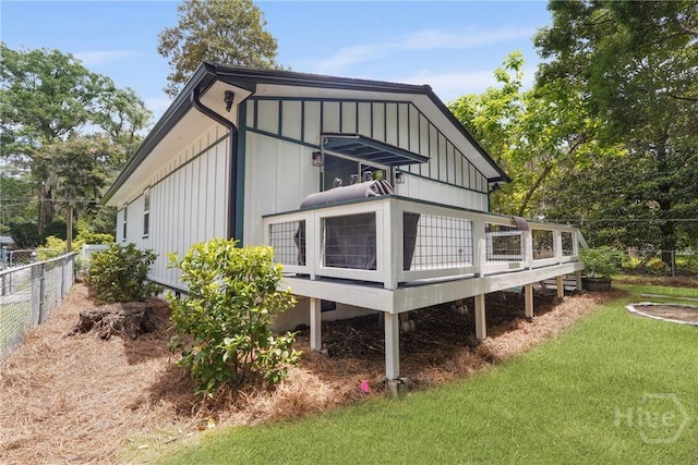 2133 Bacon Park Dr, Savannah, GA 31406 - view of side of property featuring a deck and board and batten siding