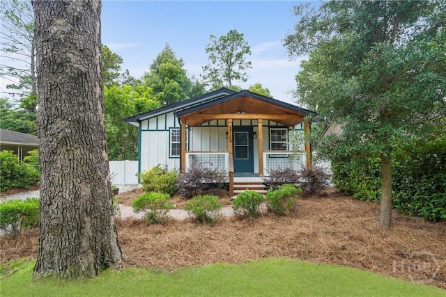 2133 Bacon Park Dr, Savannah, GA 31406 - view of front of property featuring covered porch and board and batten siding