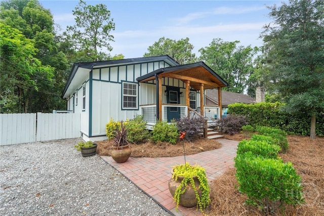 2133 Bacon Park Dr, Savannah, GA 31406 - view of front of property featuring board and batten siding and a porch
