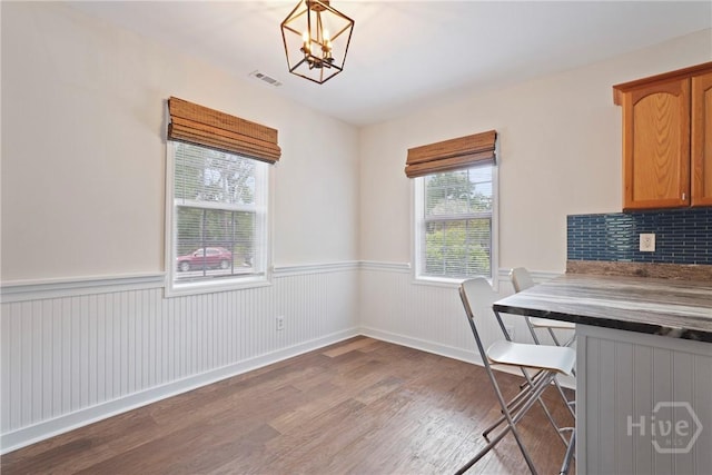 2133 Bacon Park Dr, Savannah, GA 31406 - unfurnished office with wood finished floors, wainscoting, and a chandelier