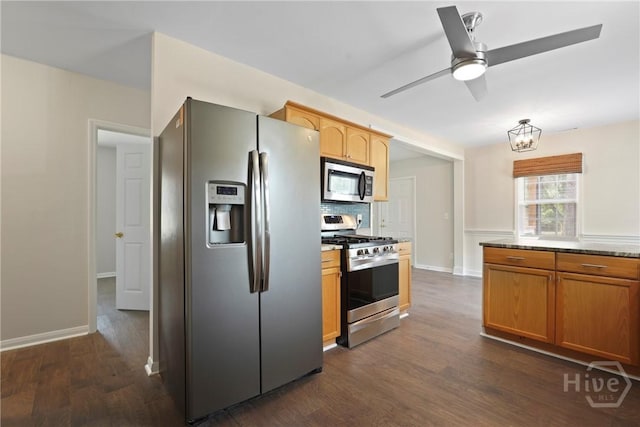 2133 Bacon Park Dr, Savannah, GA 31406 - kitchen with stainless steel appliances, dark wood-style flooring, ceiling fan, and decorative backsplash