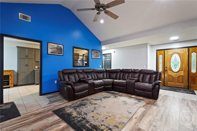 31 Pembroke Pl, Pembroke, GA 31321 - living room with a ceiling fan, high vaulted ceiling, and light wood-style floors