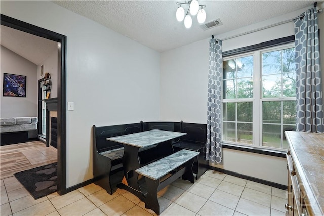 31 Pembroke Pl, Pembroke, GA 31321 - dining room with a textured ceiling and light tile patterned floors