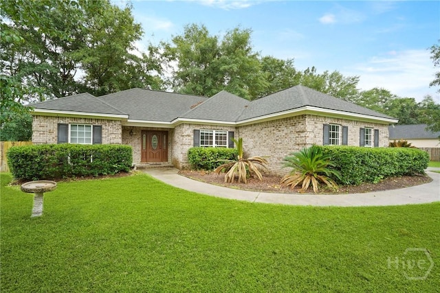 31 Pembroke Pl, Pembroke, GA 31321 - ranch-style house featuring a front lawn