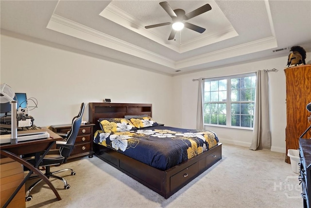 31 Pembroke Pl, Pembroke, GA 31321 - bedroom with a tray ceiling, crown molding, light colored carpet, an office area, and a ceiling fan