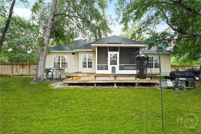 31 Pembroke Pl, Pembroke, GA 31321 - back of house with a wooden deck, a sunroom, and a shingled roof