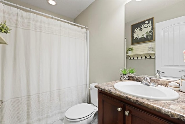 308 NE Mancey Garrason Loop, Ludowici, GA 31316 - bathroom featuring vanity and curtained shower