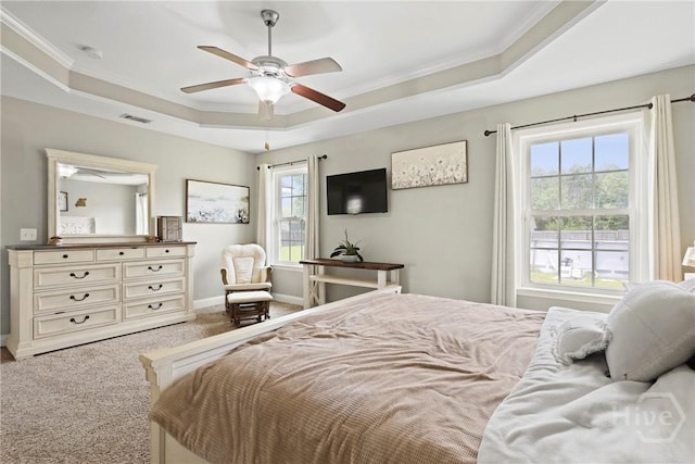 308 NE Mancey Garrason Loop, Ludowici, GA 31316 - bedroom with a tray ceiling, carpet flooring, crown molding, and a ceiling fan