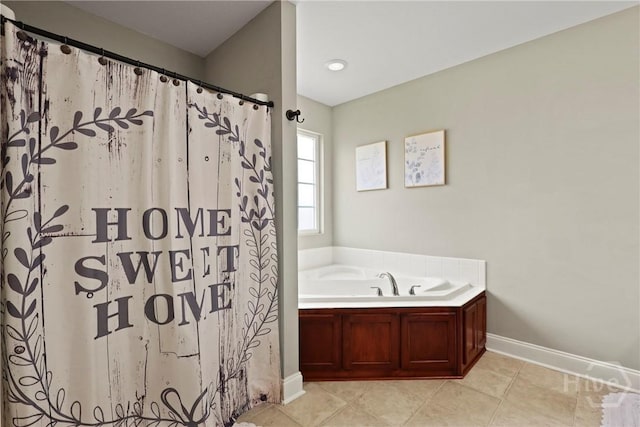 308 NE Mancey Garrason Loop, Ludowici, GA 31316 - full bath featuring a bath, tile patterned floors, and a shower with curtain
