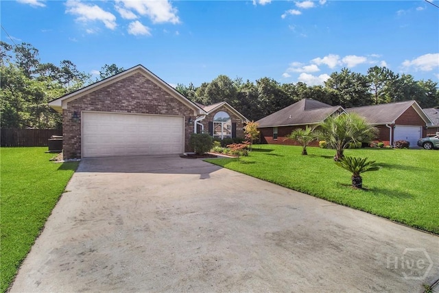 116 Gloucester Dr, Midway, GA 31320 - single story home with driveway, brick siding, and a garage