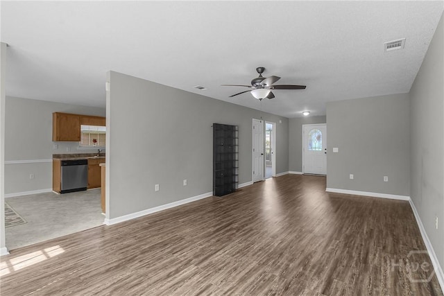 116 Gloucester Dr, Midway, GA 31320 - unfurnished living room with ceiling fan and wood finished floors