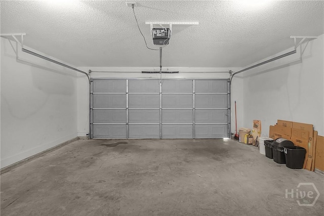 116 Gloucester Dr, Midway, GA 31320 - garage with a garage door opener and baseboards