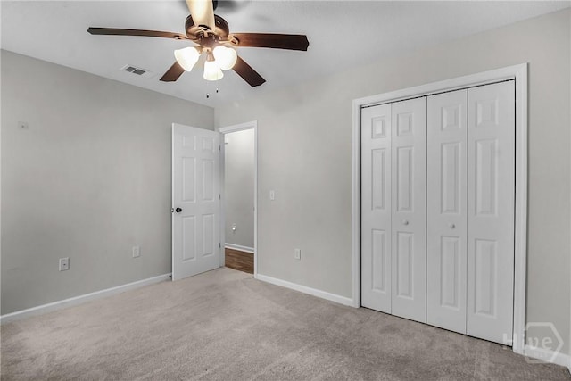 116 Gloucester Dr, Midway, GA 31320 - unfurnished bedroom featuring carpet, a closet, and ceiling fan