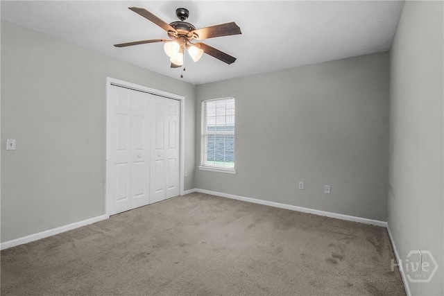 116 Gloucester Dr, Midway, GA 31320 - unfurnished bedroom featuring carpet floors, a closet, and a ceiling fan