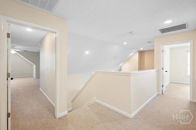 301 Marshview Dr, Richmond Hill, GA 31324 - corridor featuring an upstairs landing, carpet flooring, and recessed lighting