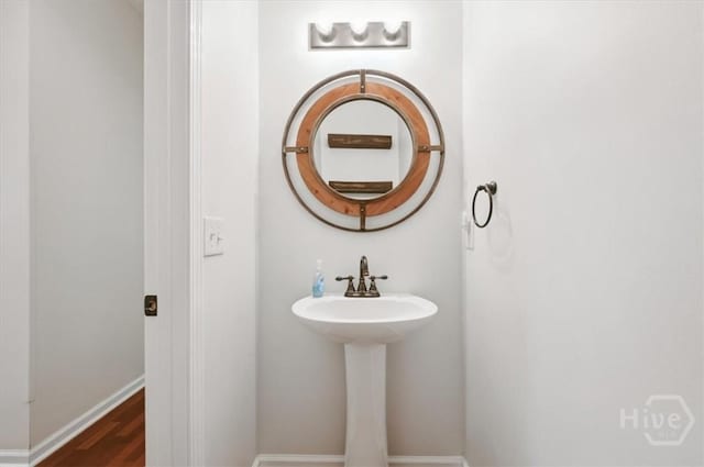 301 Marshview Dr, Richmond Hill, GA 31324 - bathroom with a sink and wood finished floors