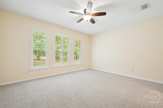301 Marshview Dr, Richmond Hill, GA 31324 - spare room with carpet flooring, a textured ceiling, and ceiling fan