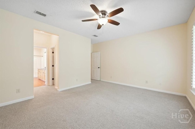 301 Marshview Dr, Richmond Hill, GA 31324 - spare room with light carpet and a ceiling fan