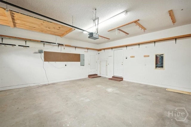 301 Marshview Dr, Richmond Hill, GA 31324 - garage with a garage door opener and electric panel