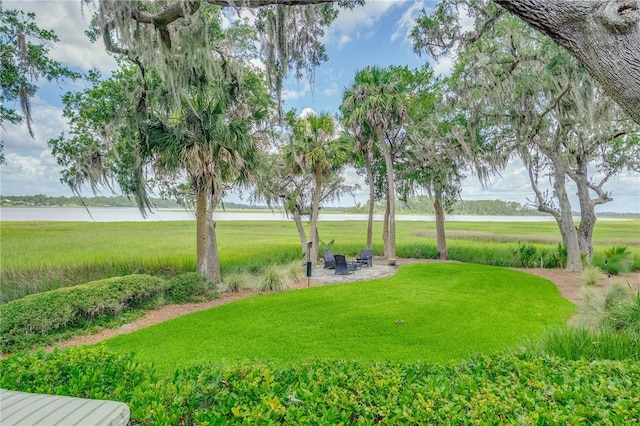 3 She Crab Cir, Savannah, GA 31411 - view of community with a yard and a water view
