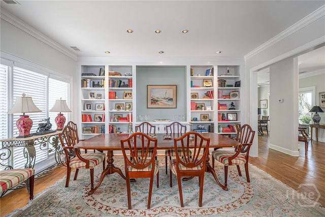 3 She Crab Cir, Savannah, GA 31411 - dining space with ornamental molding, wood finished floors, built in features, and recessed lighting