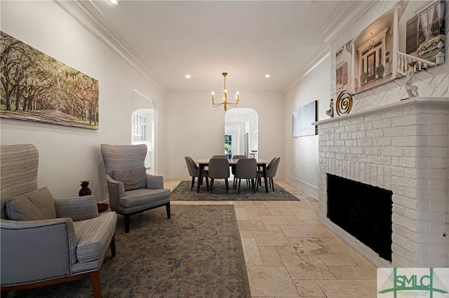 52-56 E Broad St, Savannah, GA 31401 - dining space with arched walkways, stone tile floors, a chandelier, recessed lighting, and a brick fireplace