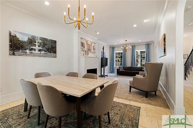 52-56 E Broad St, Savannah, GA 31401 - dining space featuring a chandelier, crown molding, stairway, recessed lighting, and a fireplace