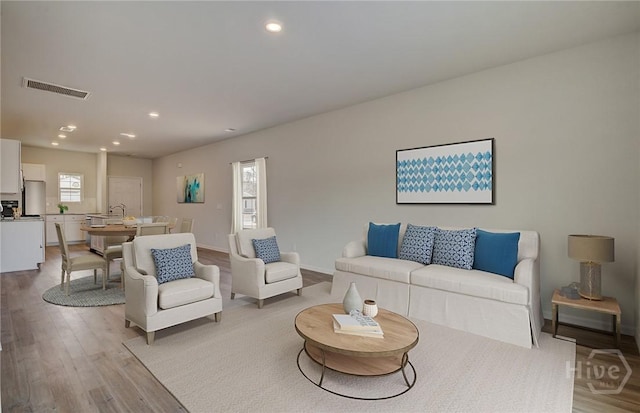 131 Crimson Ln, Savannah, GA 31302 - living room with light wood-type flooring and recessed lighting