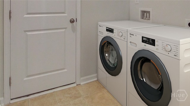 131 Crimson Ln, Savannah, GA 31302 - laundry room with washer and dryer and light tile patterned floors