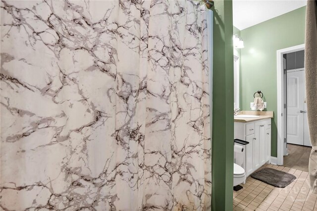 1416 Hillridge Dr, Darien, GA 31305 - bathroom with vanity, a marble finish shower, and tile patterned floors