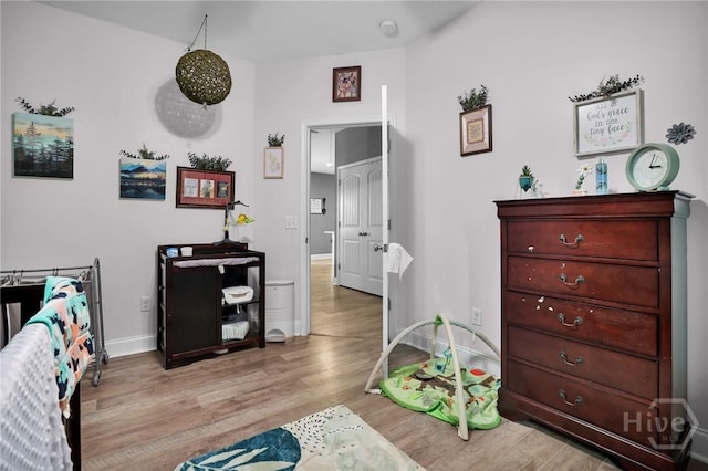 1416 Hillridge Dr, Darien, GA 31305 - bedroom featuring light wood-style floors and baseboards