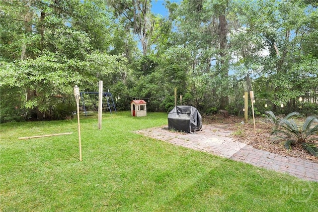 1416 Hillridge Dr, Darien, GA 31305 - view of grassy yard with a storage shed