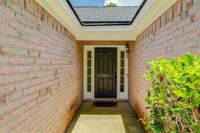 26 Dianne Mackenzie Way, Savannah, GA 31419 - property entrance with a shingled roof and brick siding
