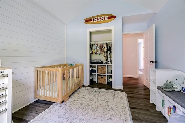 26 Dianne Mackenzie Way, Savannah, GA 31419 - bedroom with wood finished floors, lofted ceiling, a nursery area, and wood walls