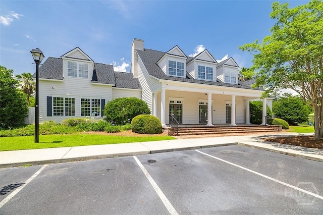 26 Dianne Mackenzie Way, Savannah, GA 31419 - view of front of home with uncovered parking and a porch