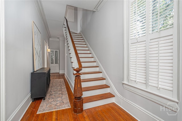 121 W Bolton St, Savannah, GA 31401 - staircase with crown molding and wood finished floors