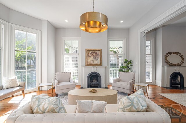 121 W Bolton St, Savannah, GA 31401 - living area featuring a fireplace, healthy amount of natural light, hardwood / wood-style floors, and recessed lighting