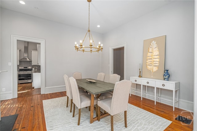 121 W Bolton St, Savannah, GA 31401 - dining area featuring a chandelier, hardwood / wood-style floors, and recessed lighting