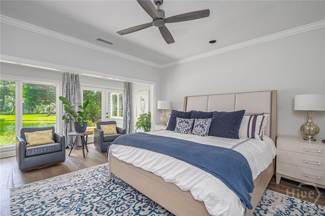 1 Broomsedge Ln, Savannah, GA 31411 - bedroom with ornamental molding, french doors, wood finished floors, ceiling fan, and access to outside