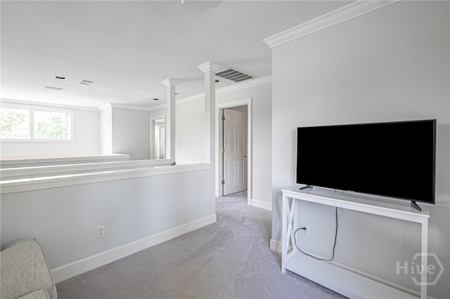 1 Broomsedge Ln, Savannah, GA 31411 - unfurnished living room with crown molding, carpet, and ornate columns