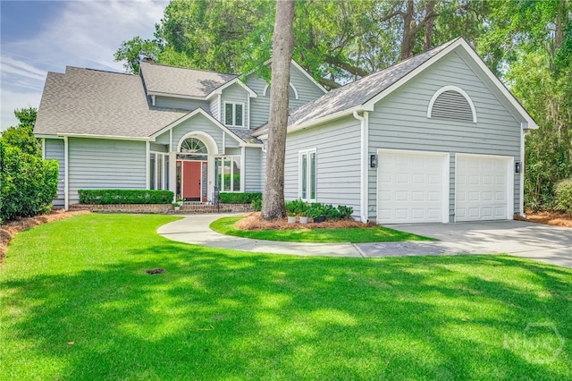 1 Broomsedge Ln, Savannah, GA 31411 - traditional-style home featuring a front lawn, concrete driveway, a shingled roof, and a chimney