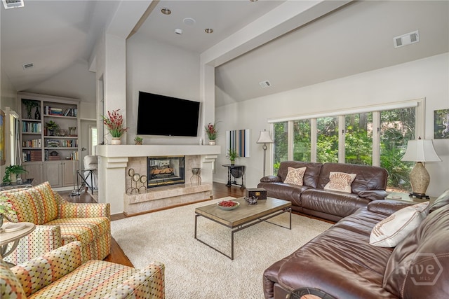 32 Hasleiters Retreat Retreat, Savannah, GA 31411 - living room featuring vaulted ceiling, a high end fireplace, and wood finished floors