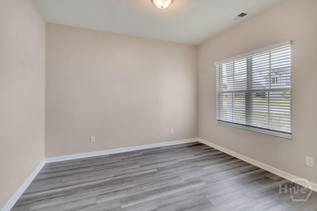 1057 Waybridge Way, Richmond Hill, GA 31324 - empty room featuring wood finished floors and baseboards