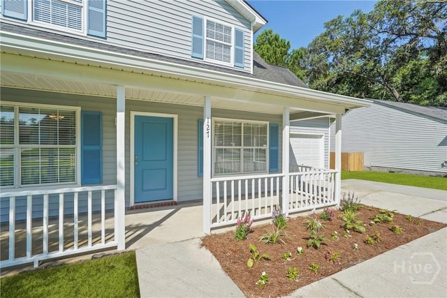 127 Laurel Green Ct, Savannah, GA 31419 - entrance to property with a porch, driveway, an attached garage, and a shingled roof