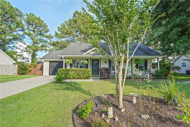 217 Bailee Ave, Rincon, GA 31326 - view of front of home featuring concrete driveway, an attached garage, and covered porch